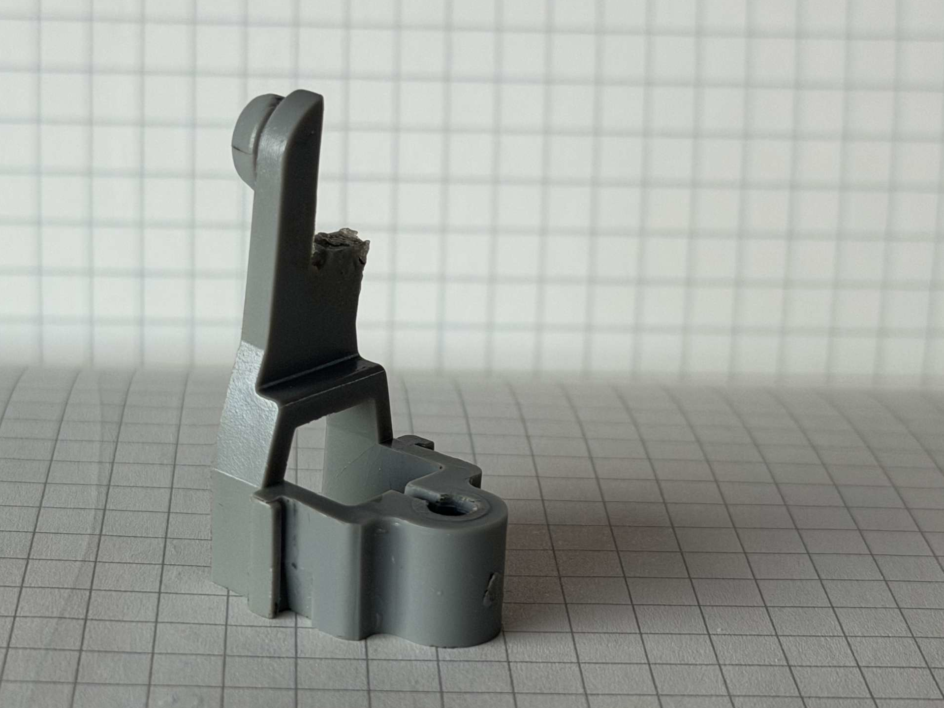 Example of a damaged automotive part requiring restoration